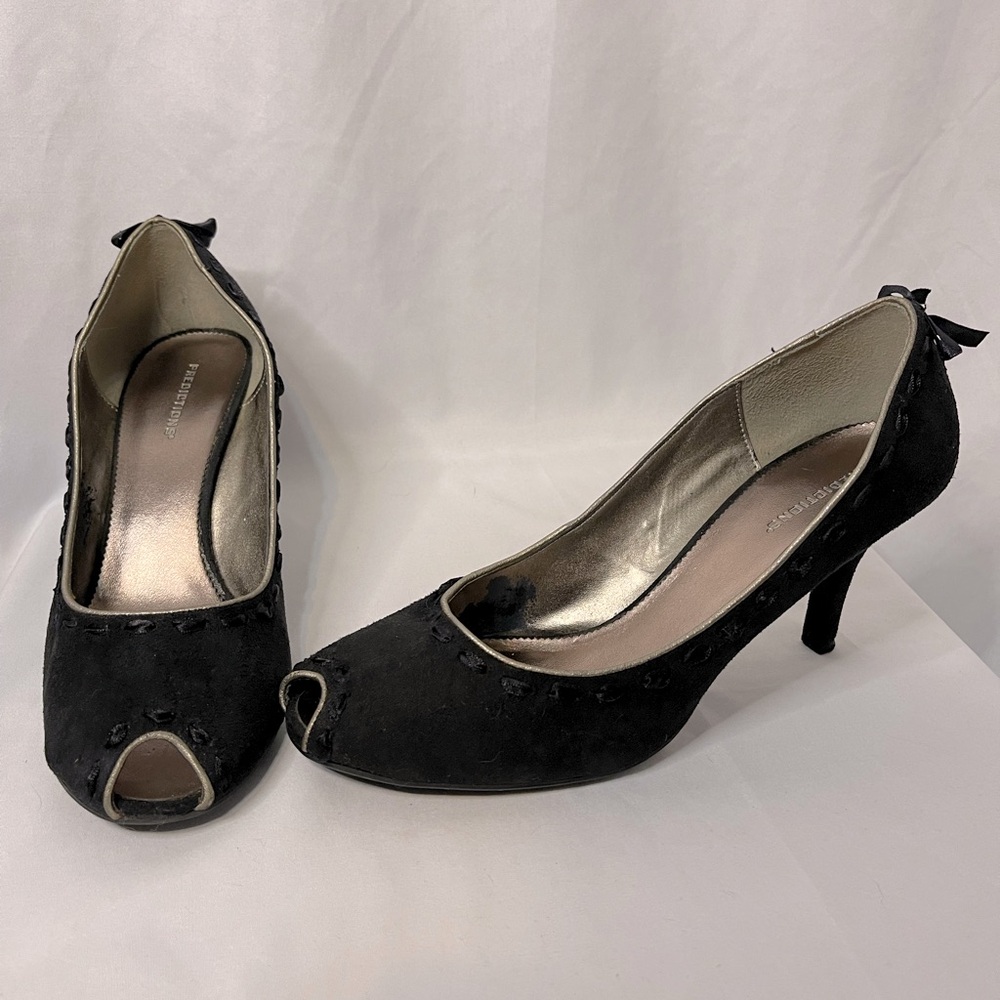 Black suede slip-on heels with ribbon detail and gold trim